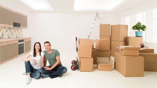 Packed household goods ready for transport by removals company
