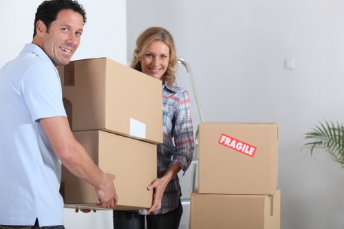 Loading a moving truck with boxes and furniture