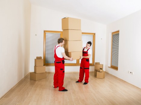 Unpacking service setup in a Ruislip home with organized boxes and furniture placement