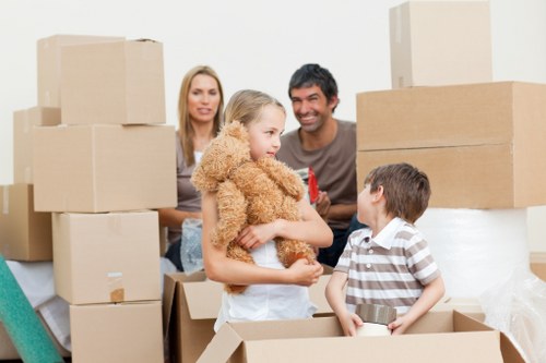 Family settling into a new home after moving in Ruislip